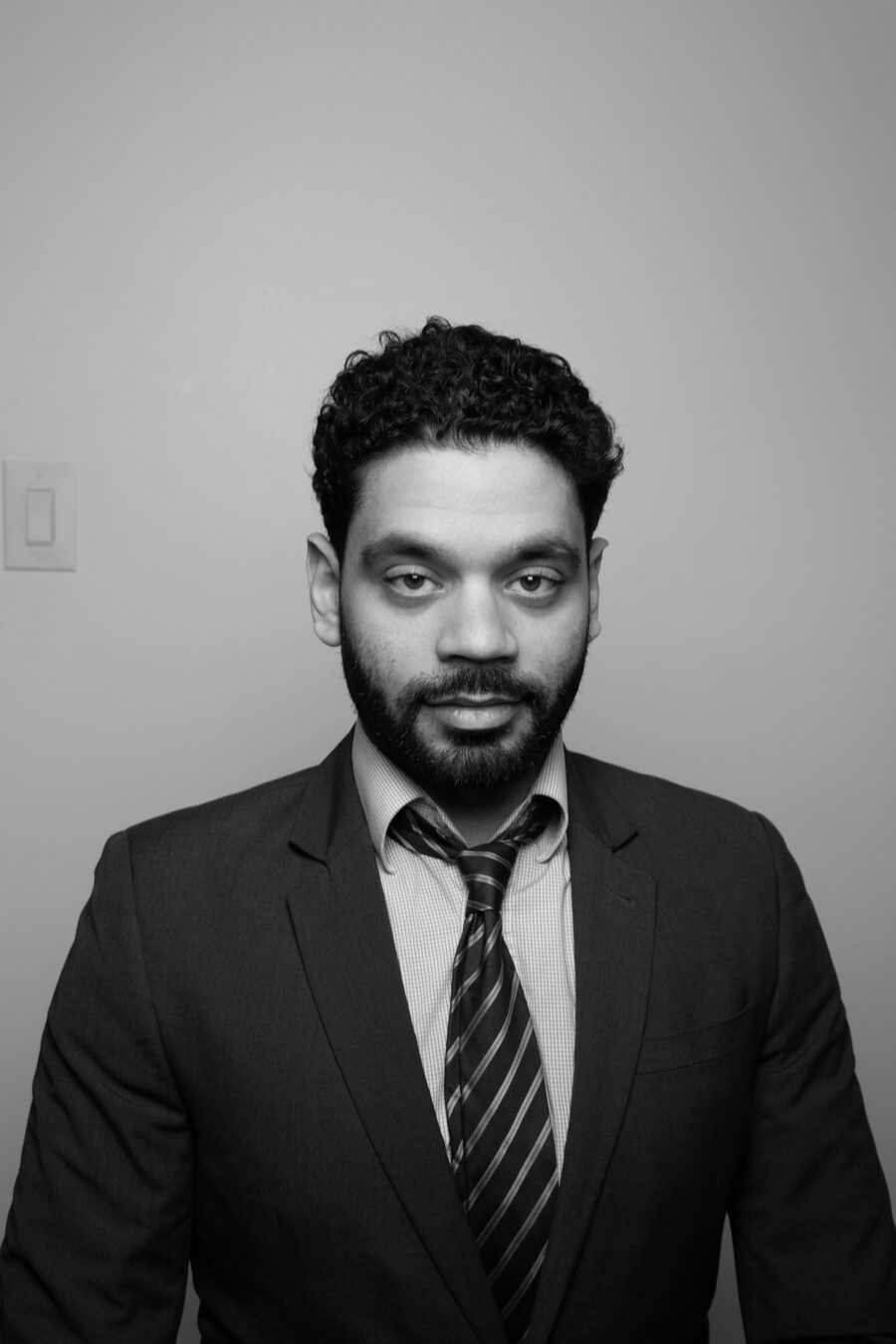 Portrait of Jaabel in a suit and tie